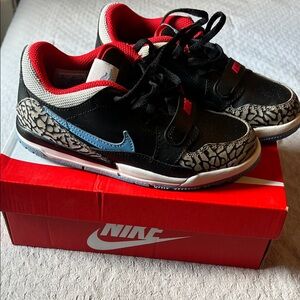 Nike Kids Black and Red Sneakers with Blue Swoosh